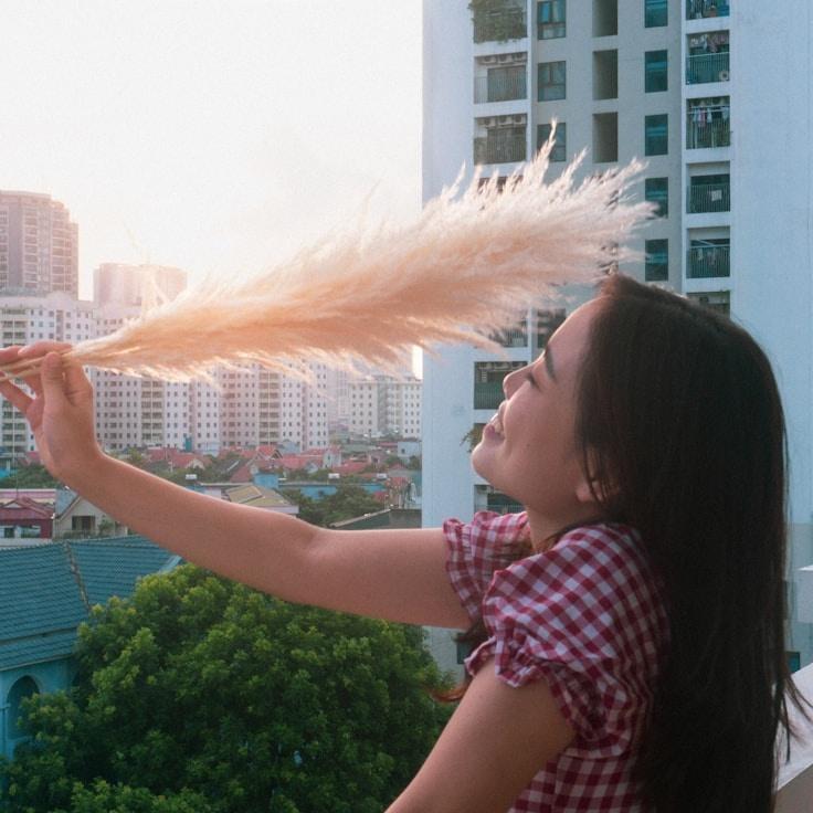 Aarav Singh, Lead Design Curator at PioneerHarborCrest, reviewing corporate floral arrangements